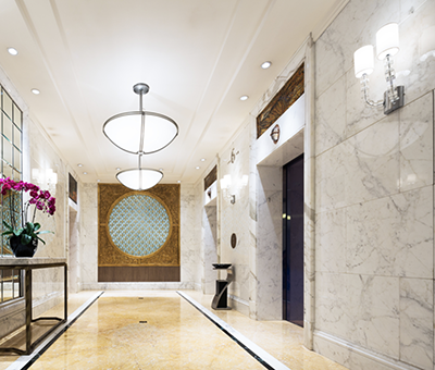 Natural stone wall cladding in interior corridor