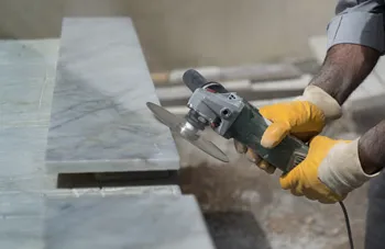 Safe handling and cutting of marble and travertine